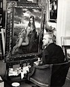 With one of his favorite paintings
